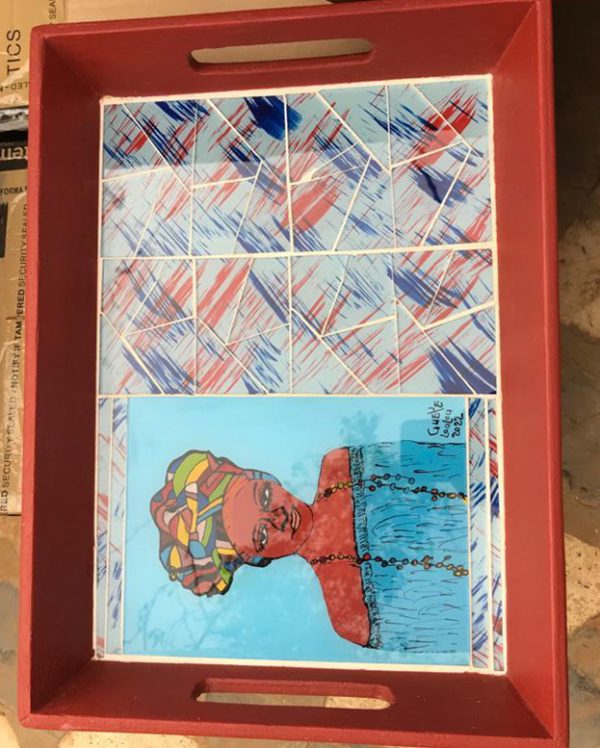 Tapa de madera y cristal.